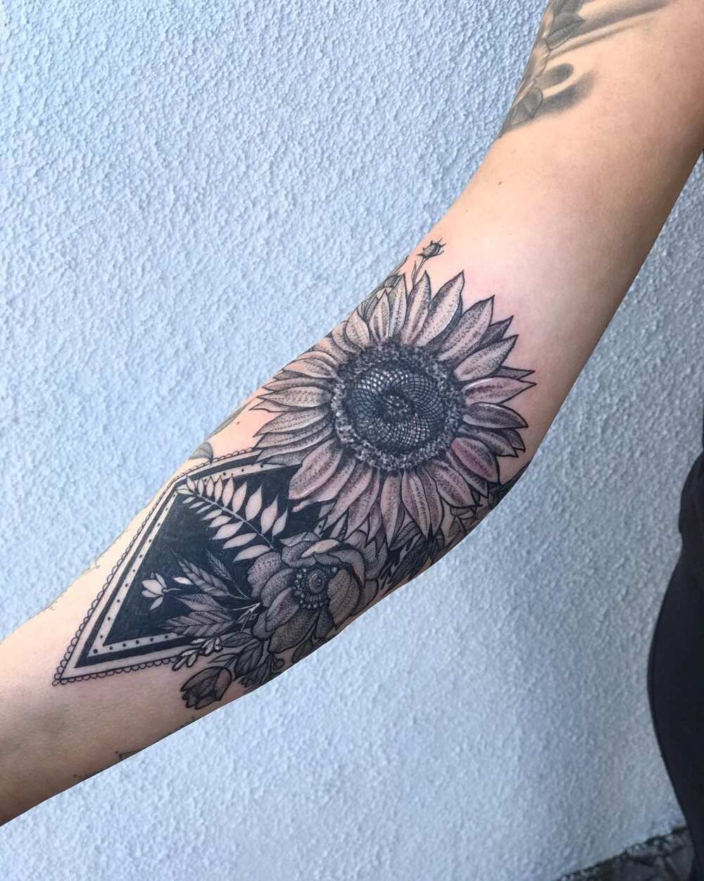 small sunflower tattoo