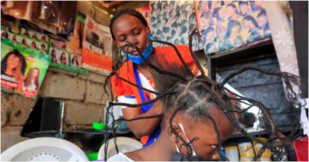 Nairobi hairdressers invent new spiky style resembling coronavirus to create awareness