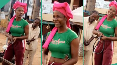 Hot-looking Nigerian lady goes to her father's vulcaniser workshop, helps him with work