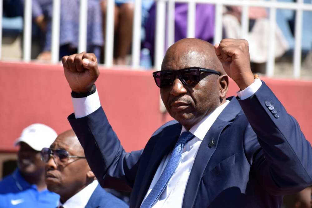 Lesotho Prime Minister Sam Ntsokoane Matekane raises fists in celebration as he arrives at Setsoto stadium in Maseru on October 28, 2022 take oath.