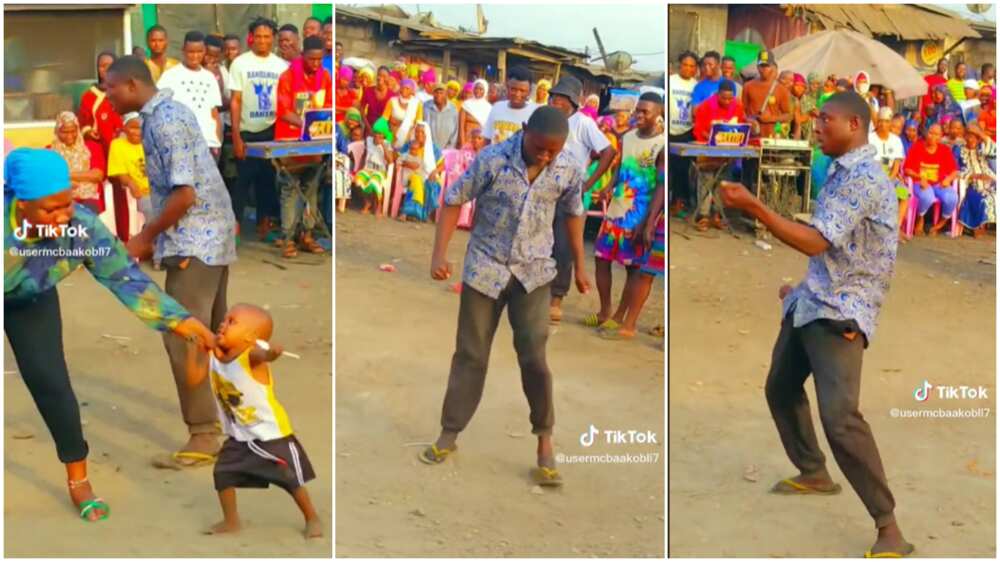 Man's dance moves in public/baby pulled from dance scene.
