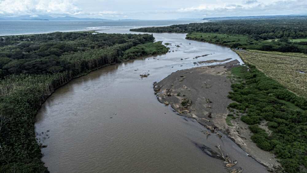 View of the Tarcoles River, one of the most polluted in Central America, as it flows into the Pacific Ocean.