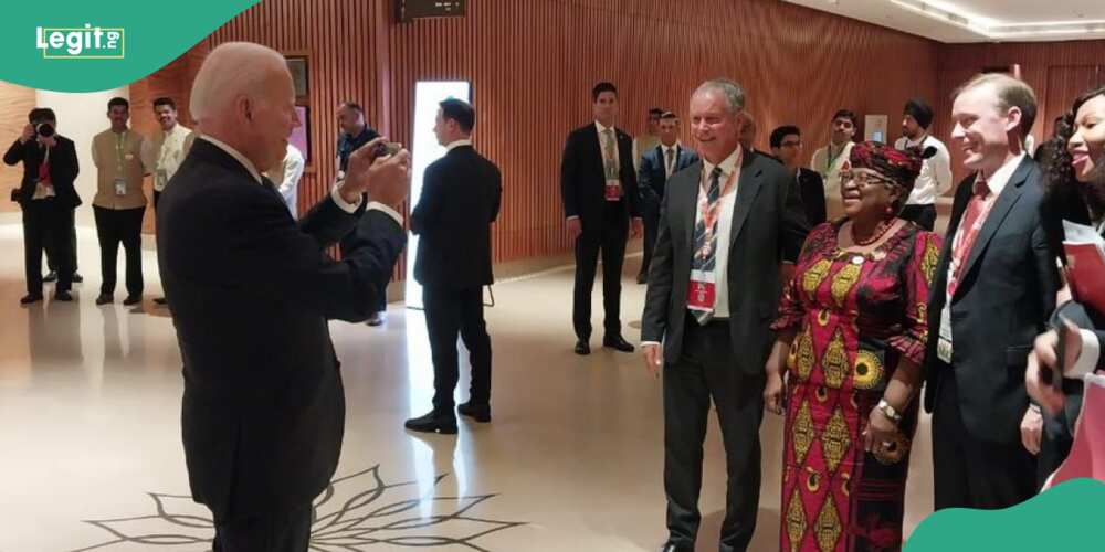 US President Biden takes photos of Okonjo-Iweala