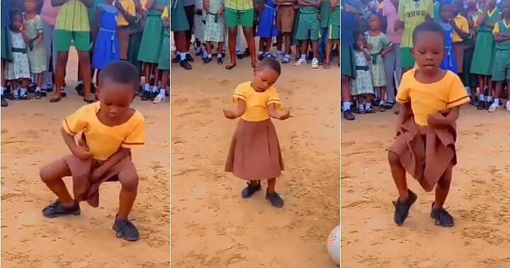 Little girl dances to Overdoze, dressed in uniform