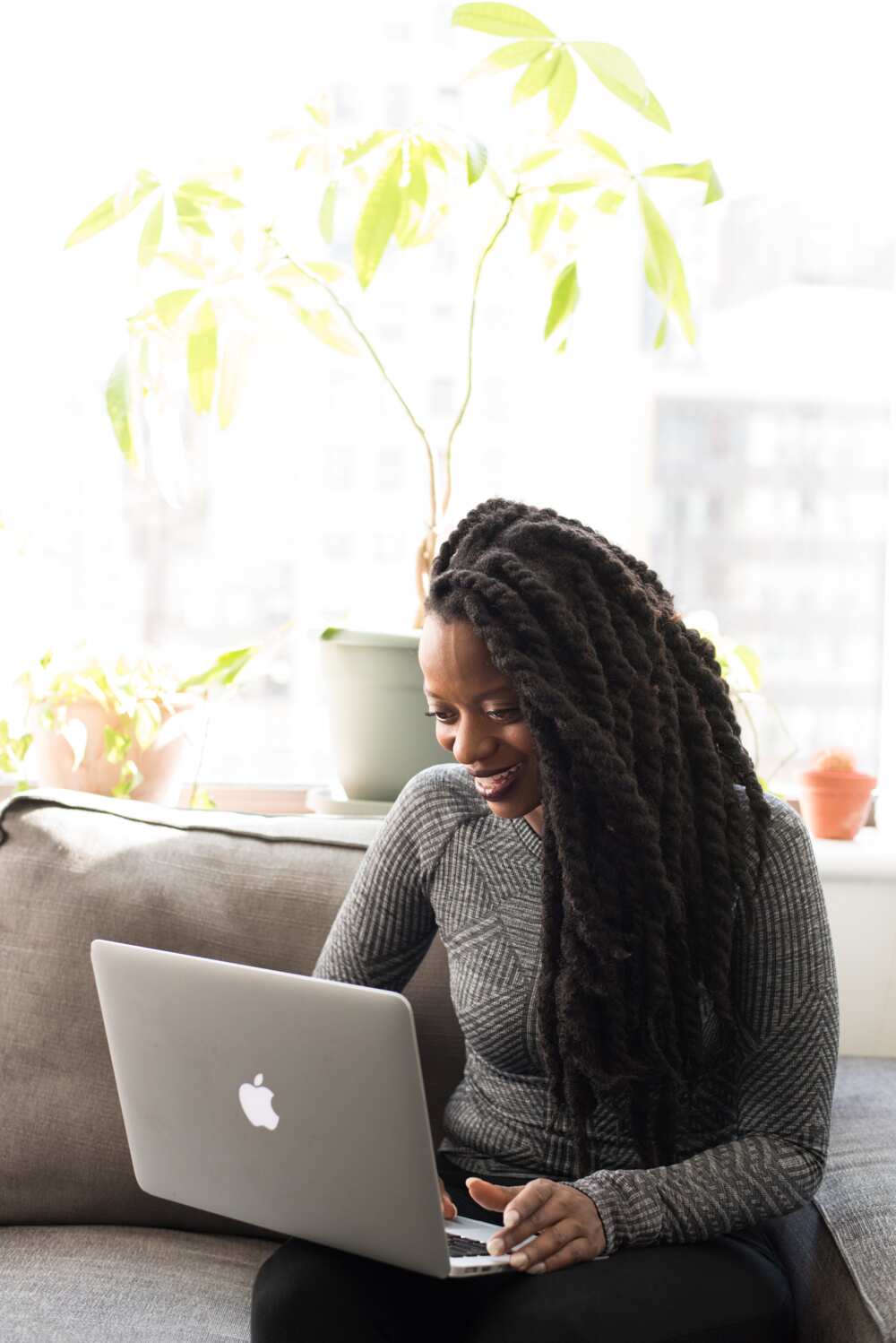 Woman registering on a dating site in Nigeria
