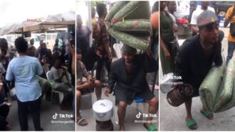 Drama at bank as Nigerian man shows up with bed, gas cooker and pot, demands his money, funny video trends