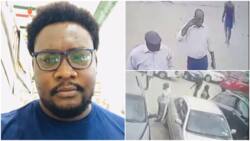 Nigerian man withdraws N400k from bank, says 2 men later broke into his car & took it, shares CCTV footage