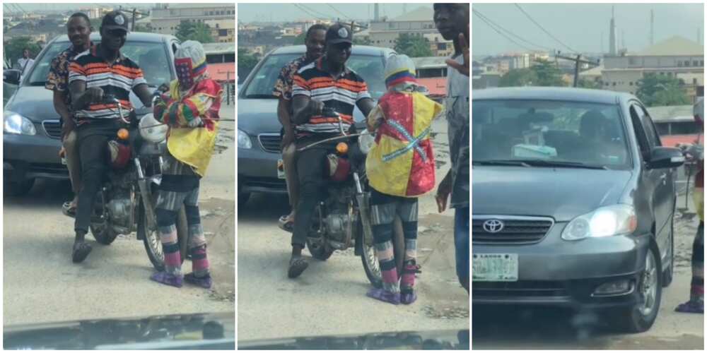 Young masquerade disturbs road users in video, Nigerians react