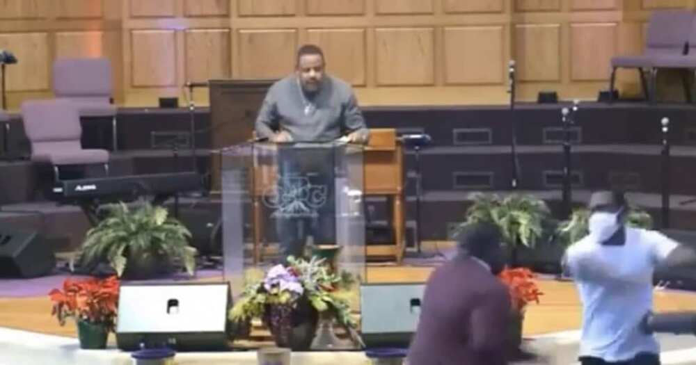 Drama at church as young man fights pastor during service in video