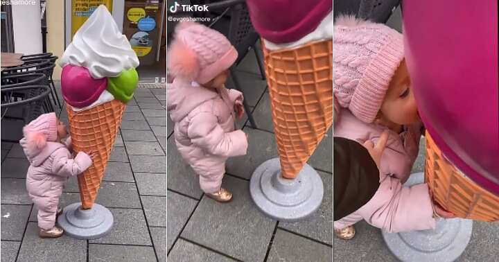 Ice cream statue, little girl licks statue