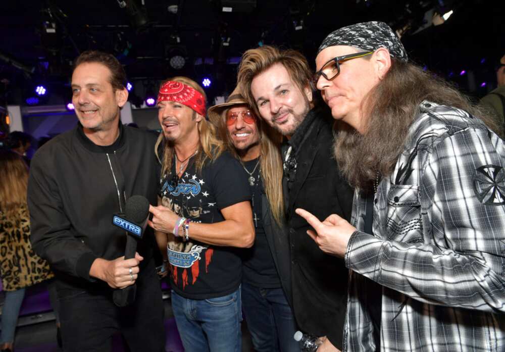 Poison members attend a press conference at SiriusXM Studios