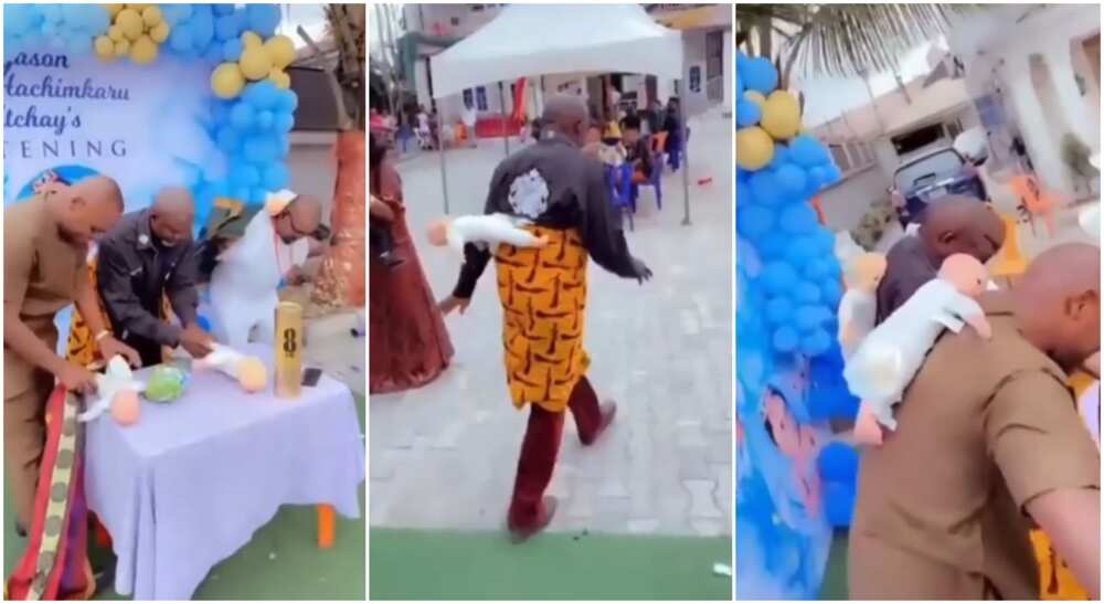 Three Nigerian men have been seen in an entertaining video learning how to back kids. Three Nigerian men have been seen in an entertaining video learning how to back kids.