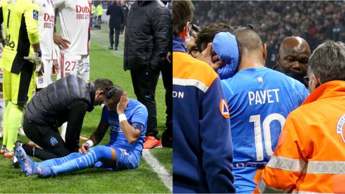 The moment Dimitri Payet got struck by bottle of water as Lyon vs Marseille suspended after just 4 minutes