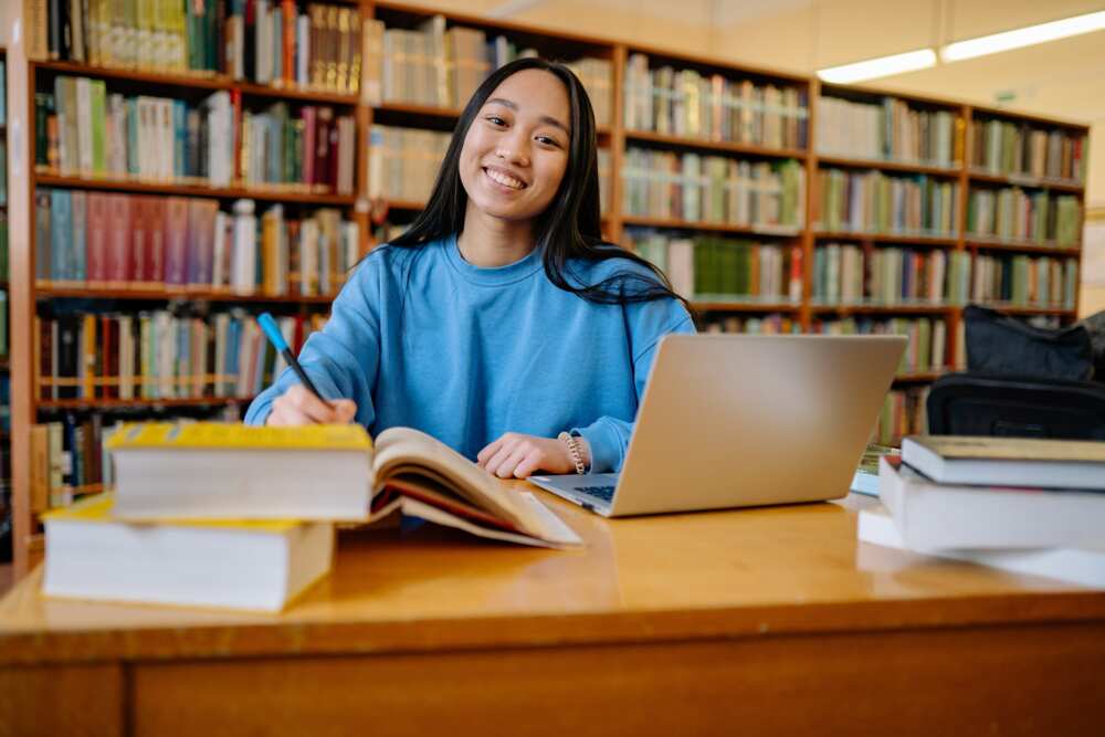 A student in the library studying