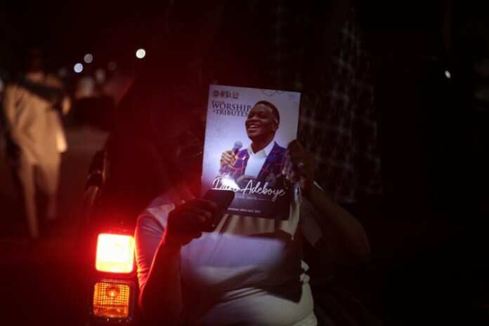 Photos emerge as hundreds hold candlelight procession for late Dare Adeboye