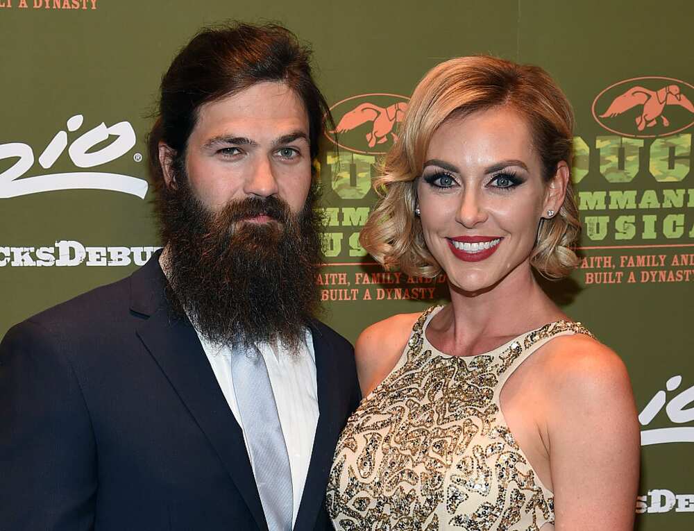 Jep Robertson and Jessica Robertson posing for a photo
