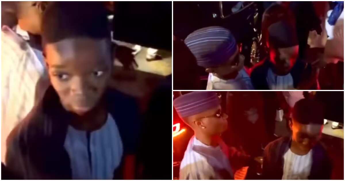 See viral video of Wizkid's interaction with his 1st son Bolu at his mum's burial that has got Nigerians talking