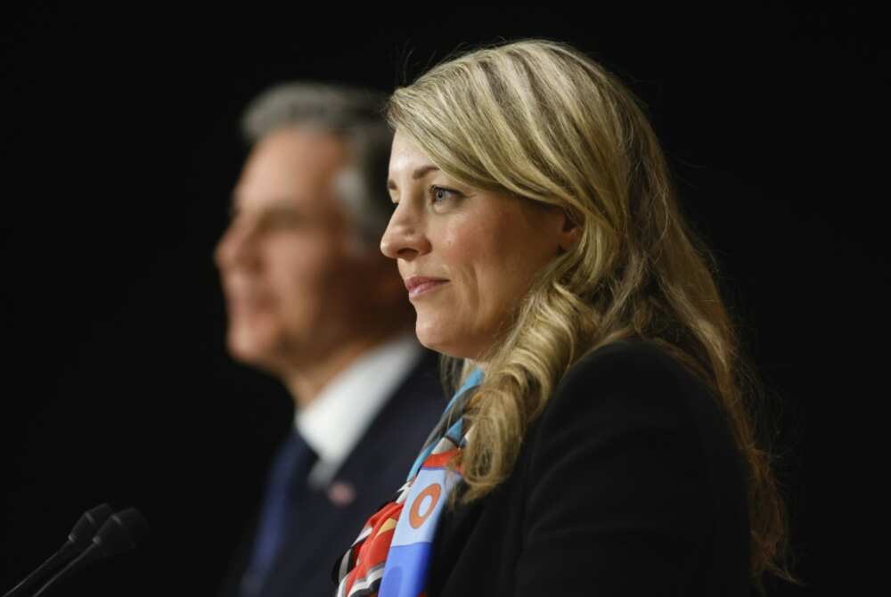 Canada's Foreign Minister Melanie Joly (R), seen here with US Secretary of State Antony Blinken, has ordered Russia's ambassador to Ottawa to be summoned over anti-LGBT tweets
