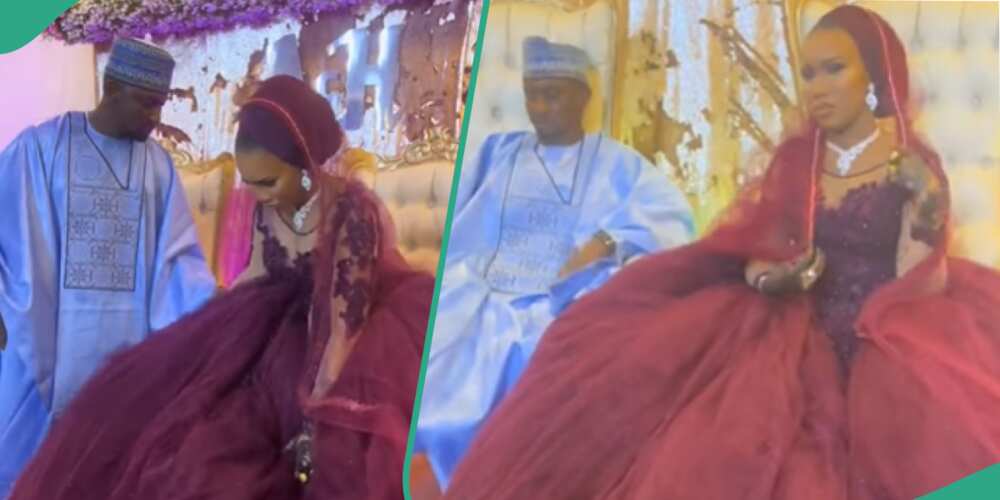 Hausa bride looks uncomfortable in wedding dress