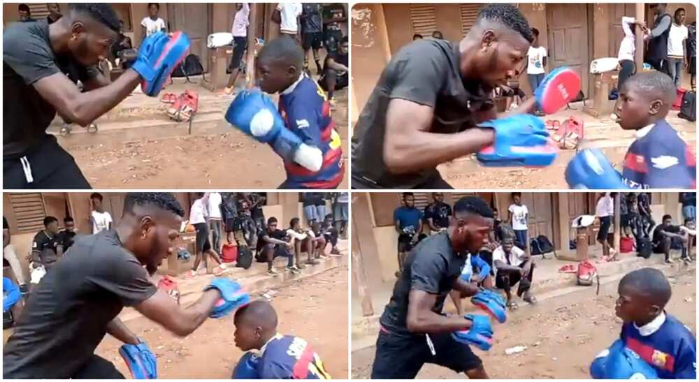 Photos of Sultan, Nigerian kid boxer and his trainer, Tipo.