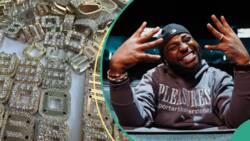 Davido splurges millions on a customised diamond chain for his 30BG crew members: "001 for all"