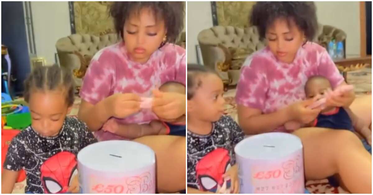 Despite cash scarcity, see how Regina Daniels loaded her children's piggy banks with new notes