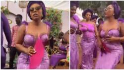 Beautiful asoebi lady in purple dazzles netizens with gorgeous style and enviable dance steps