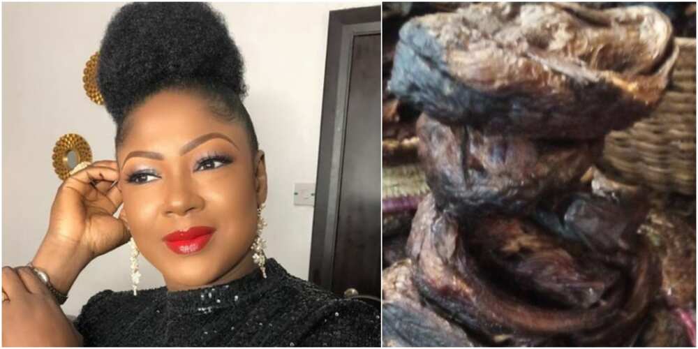 Susan Peters buys expensive fish from the market