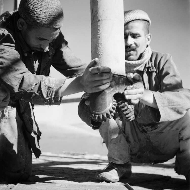 A picture from 1946 shows Moroccan workers install an oil well during prospecting in the Rharb region in the country's north-west