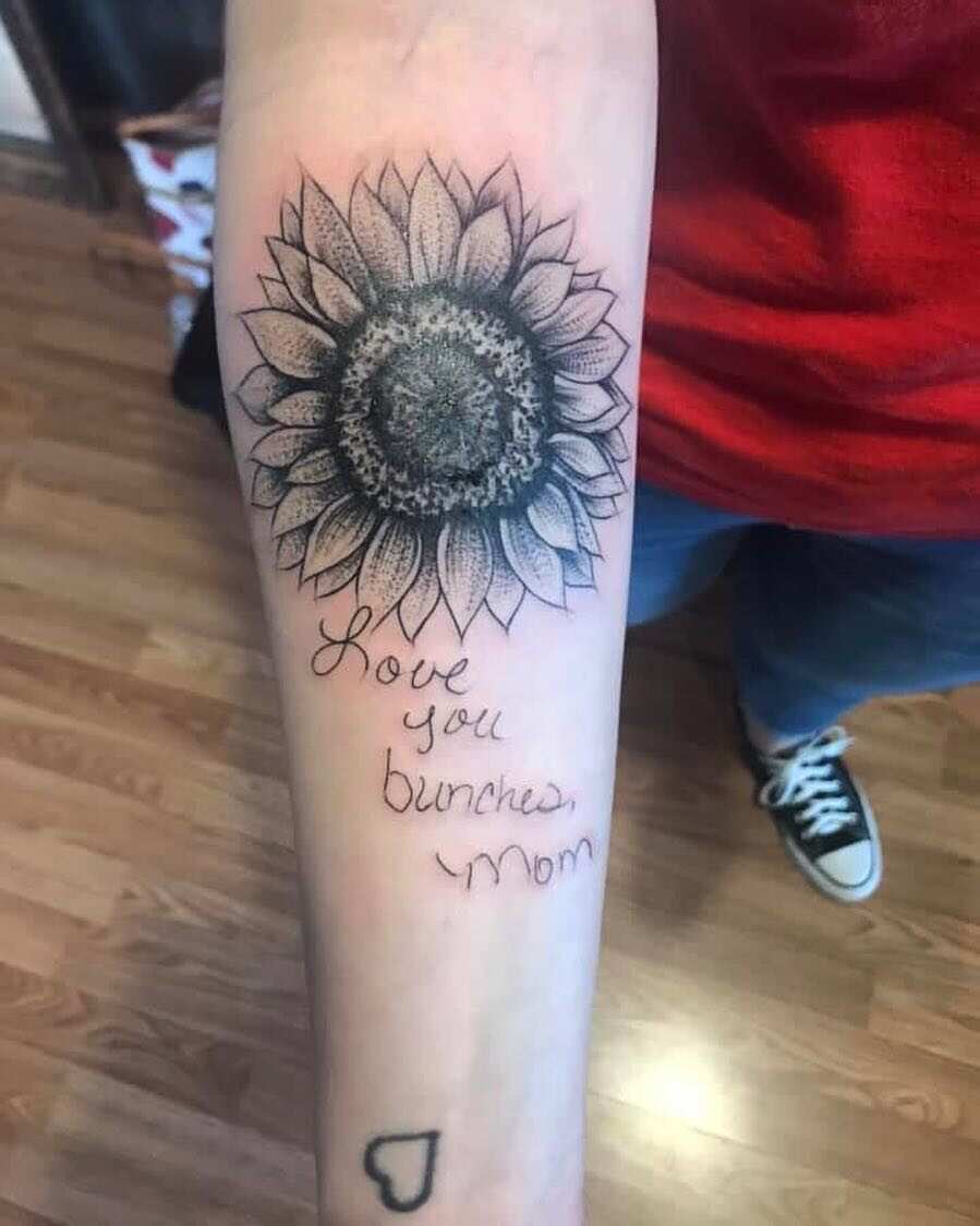 Small sunflower tattoo