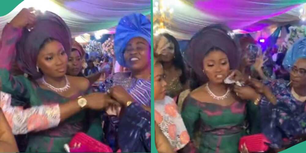 Confusion as bride's sister stops woman from spraying money on her