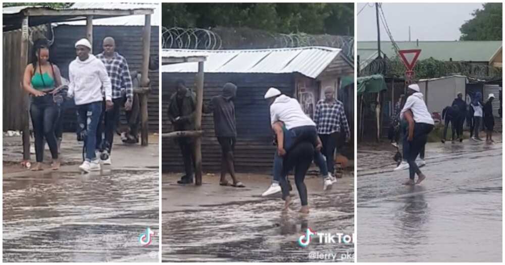 She back-carried her boyfriend, lady carries boyfriend on her back, crosses flooded road
