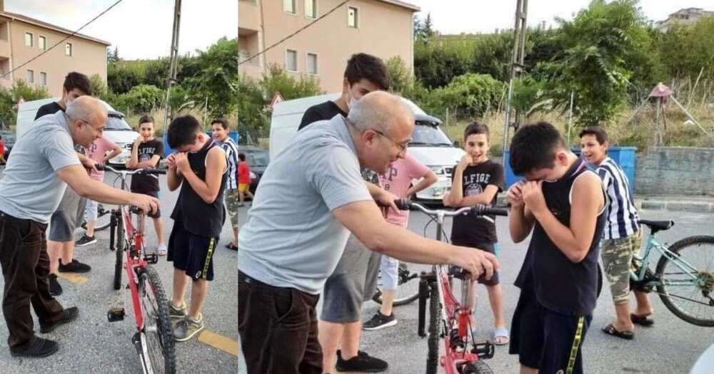 Kid given new bike after denting motorist's car with old one Kid given new bike after denting motorist's car with old one