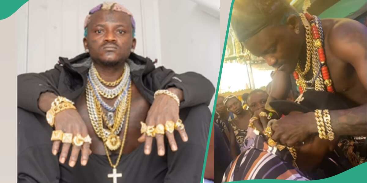 See video of Portable gifting his signee Cuban necklace that has got fans talking