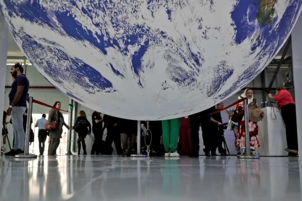 Participants tour the Sharm el-Sheikh International Convention Centre, in Egypt's Red Sea resort city of the same name, during the COP27 climate conference