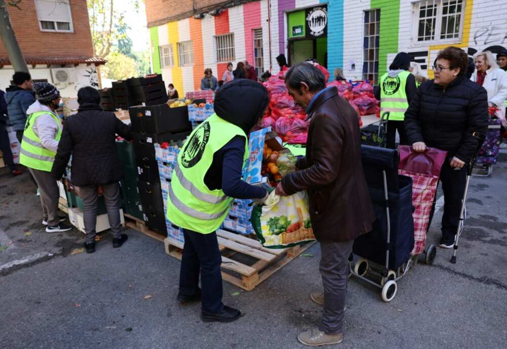Lines dubbed 'hunger queues' can be seen regularly outside food banks across Spain