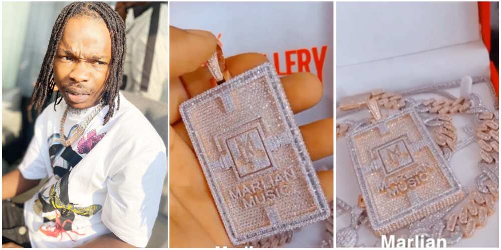 Bling Gang: Rapper Naira Marley Flaunts New Diamond-Studded Marlian Music Pendant, Necklace