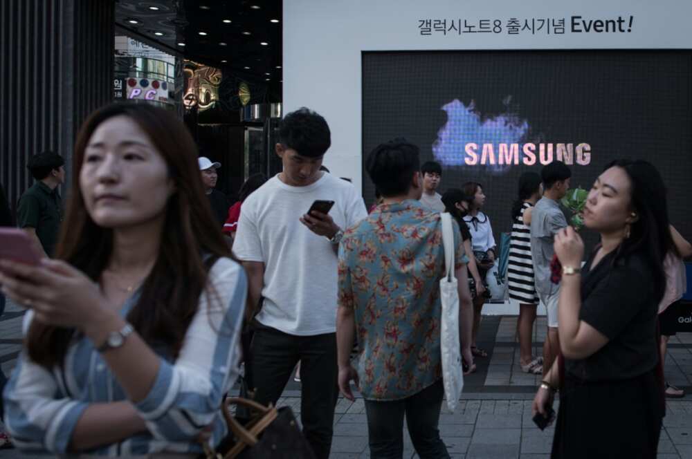 People sometimes just spend too long staring at their phone, even when they are walking along the street, says Cooper People sometimes just spend too long staring at their phone, even when they are walking along the street, says Cooper