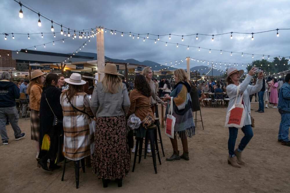 People attend a food and wine festival at a vineyard in Mexico's Guadalupe Valley