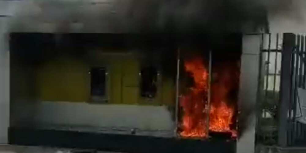 Angry youths burn bank