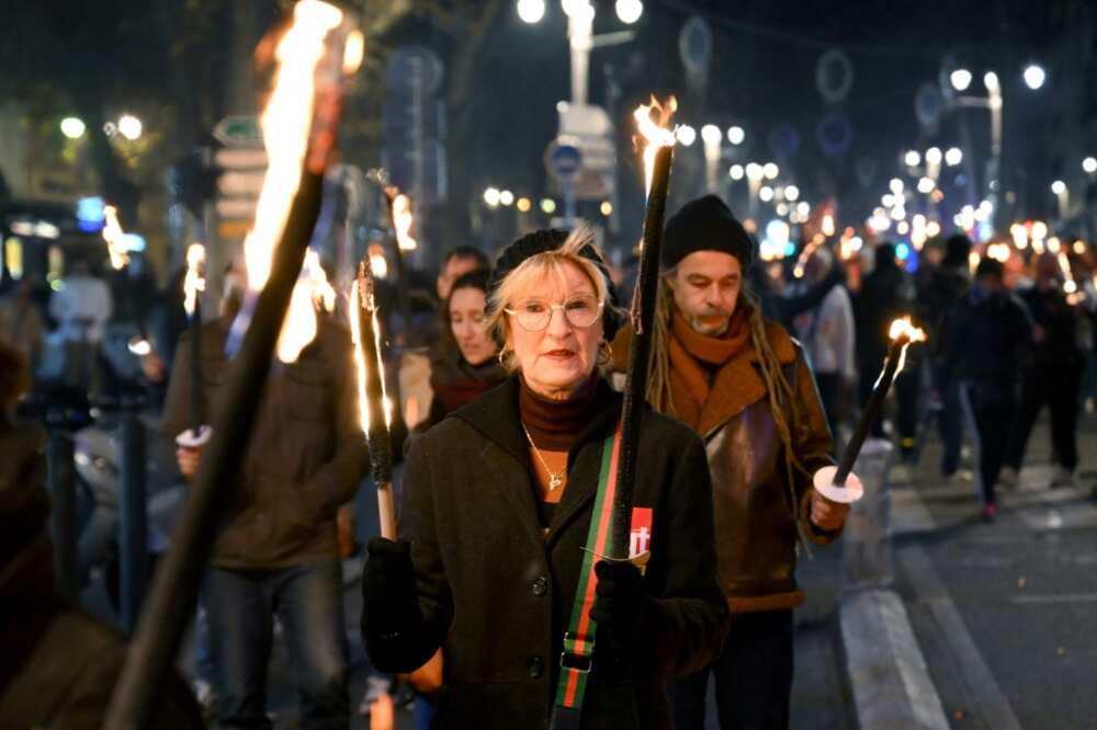 French protesters march against the pensions reform plan in the southern city of Marseille on January 17. A mass strike is planned for Thursday