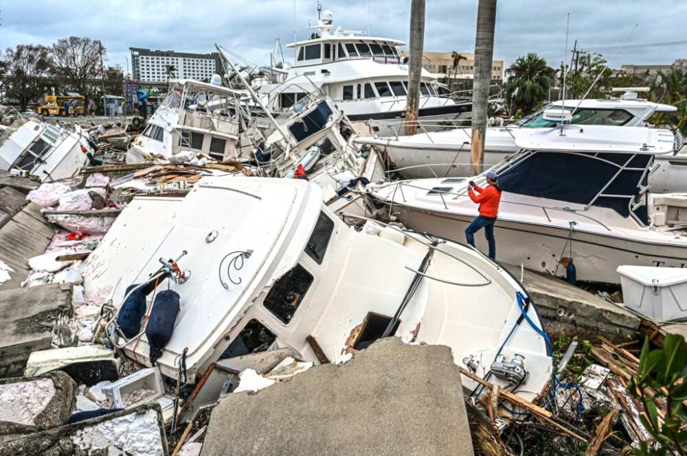 Fox Weather Correspondent Robert Ray takes photos of boats damaged by Hurricane Ian in Fort Myers, Florida, on September 29, 2022 Fox Weather Correspondent Robert Ray takes photos of boats damaged by Hurricane Ian in Fort Myers, Florida, on September 29, 2022