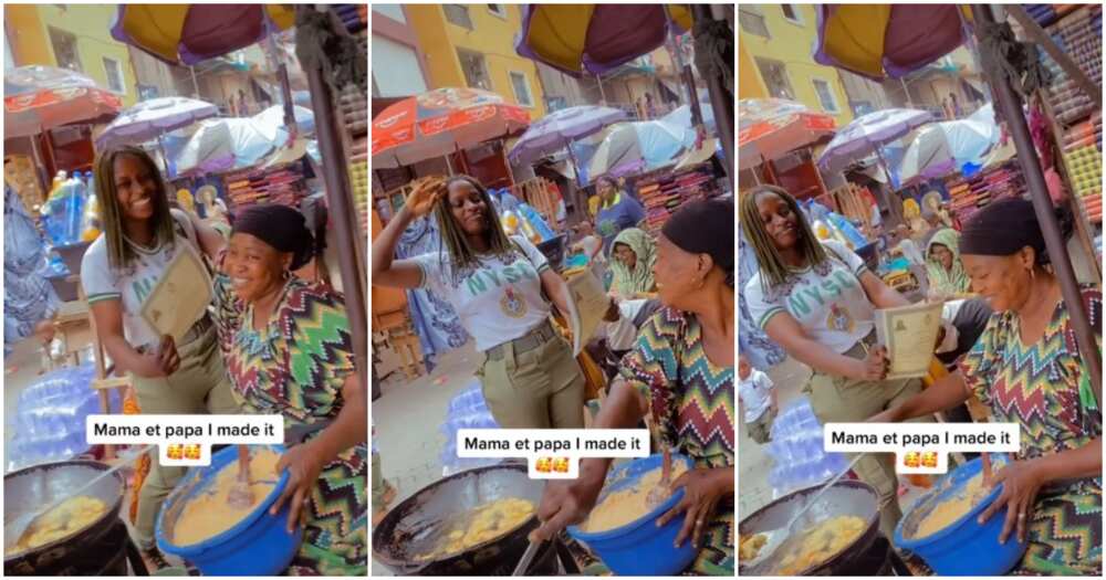 Female corps member, corper salutes mum in market, NYSC, corps member, NYSC certificate