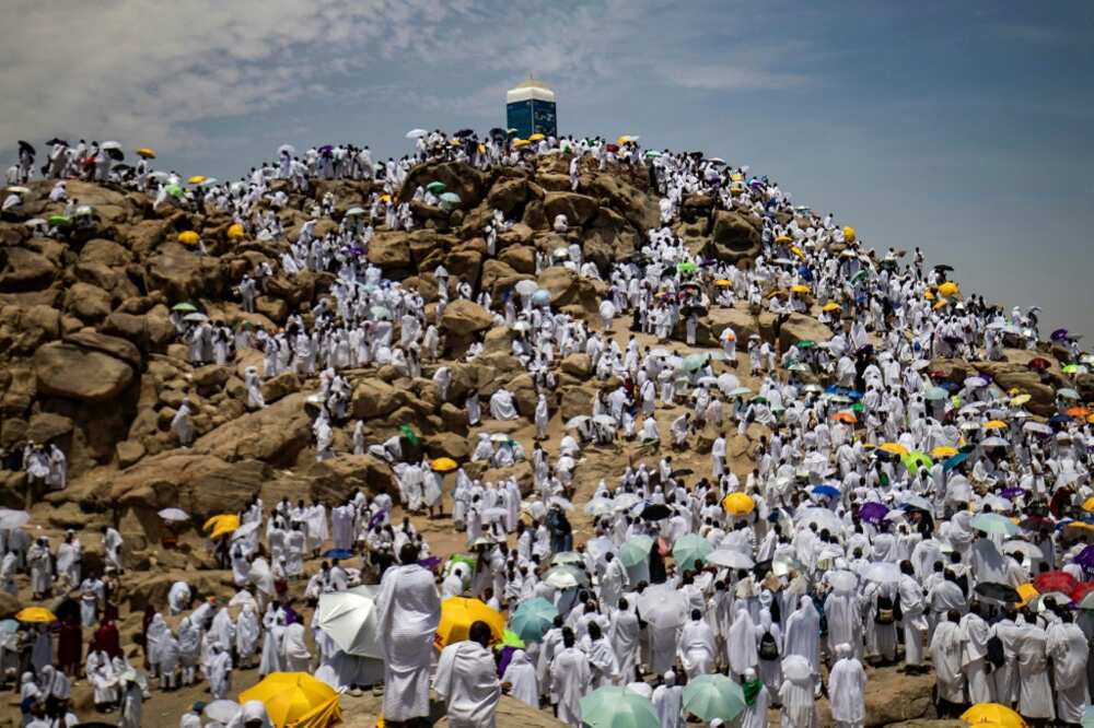 Muslim pilgrims gather atop Mount Arafat, southeast of the holy city of Mecca. This year, participation was capped at almost one million fully vaccinated worshippers