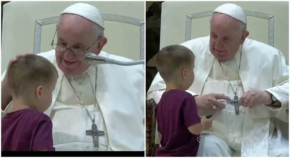Pope Francis with a little boy who met him on stage.
