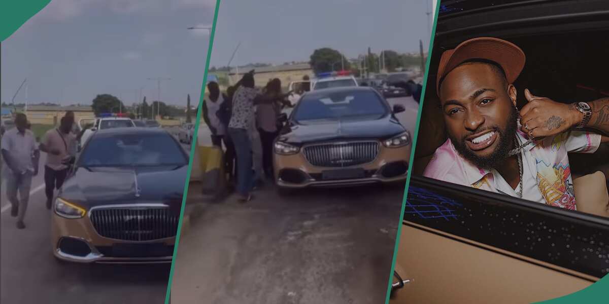 Video: Watch Davido make dollars rain as Lagos big boys run after his Maybach, security convoy