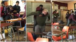 Stubborn secondary school kids scatter class, drag each other, student jumps on teacher's back in funny video
