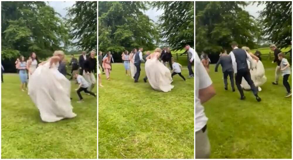 Bride plays football on her wedding day.