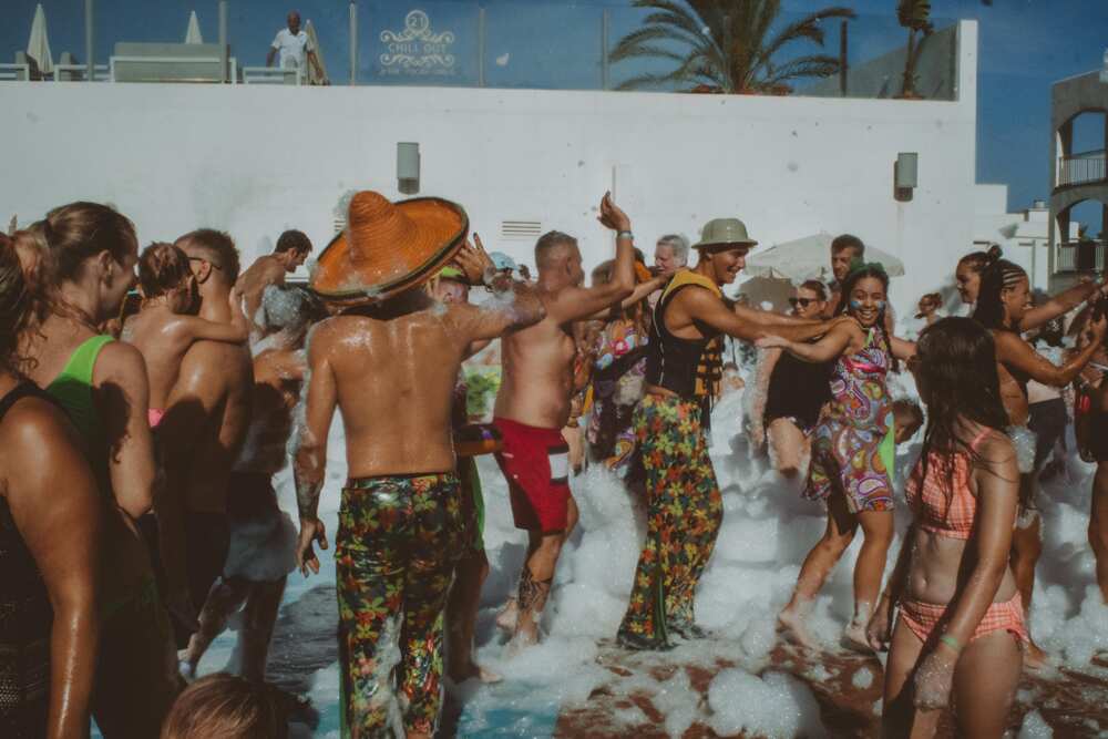 A group of people at an outdoor foam party