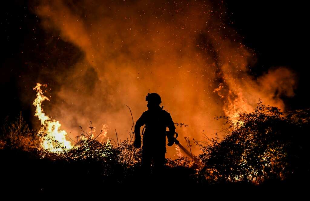 Forest fires rage in scorching southwest Europe